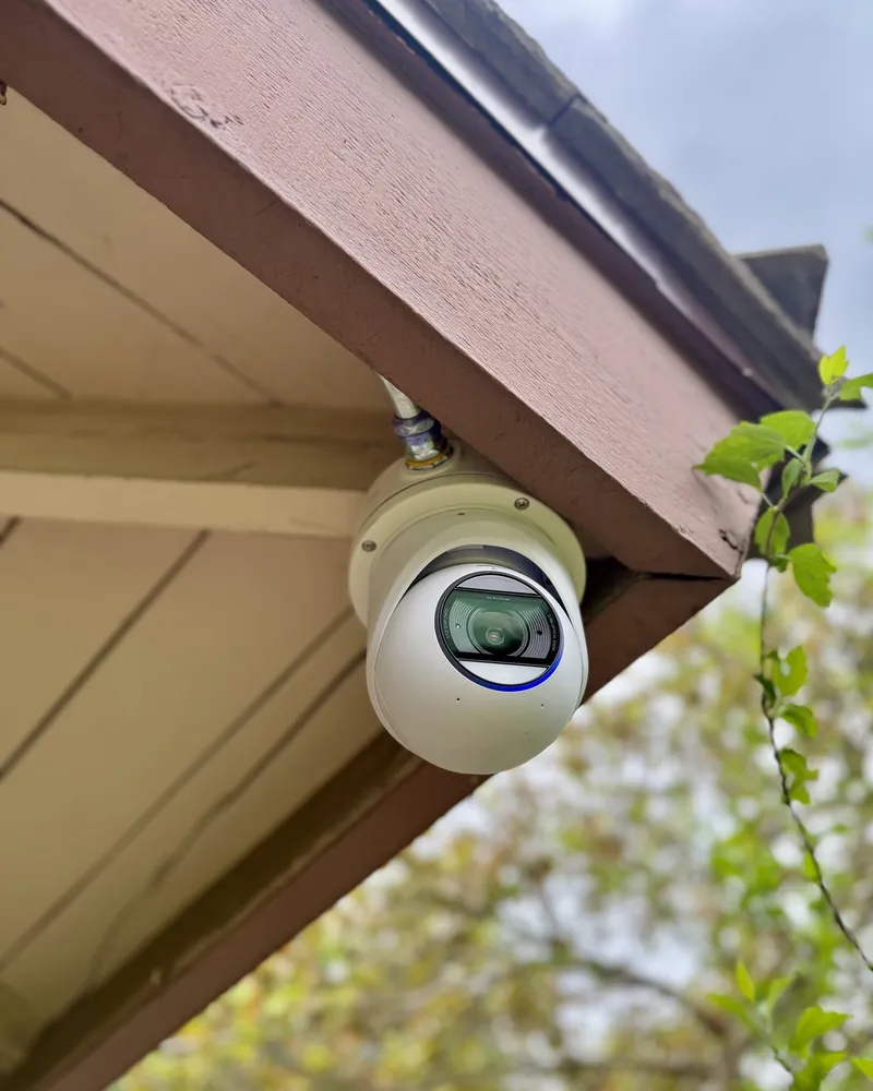 Dome camera under a roof eave