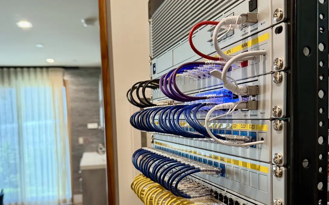 UniFi rack with labeled patch panels