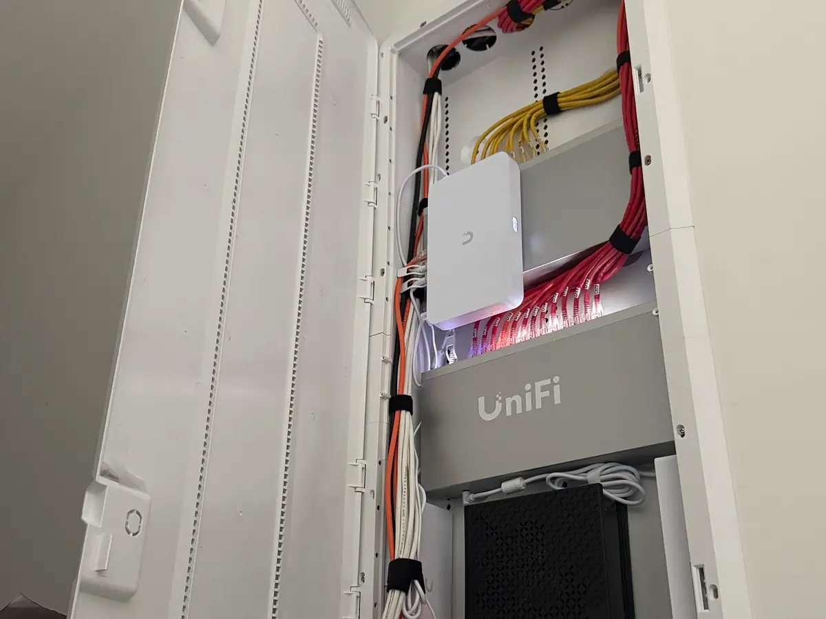 Recessed enclosure with UniFi gateway and switch