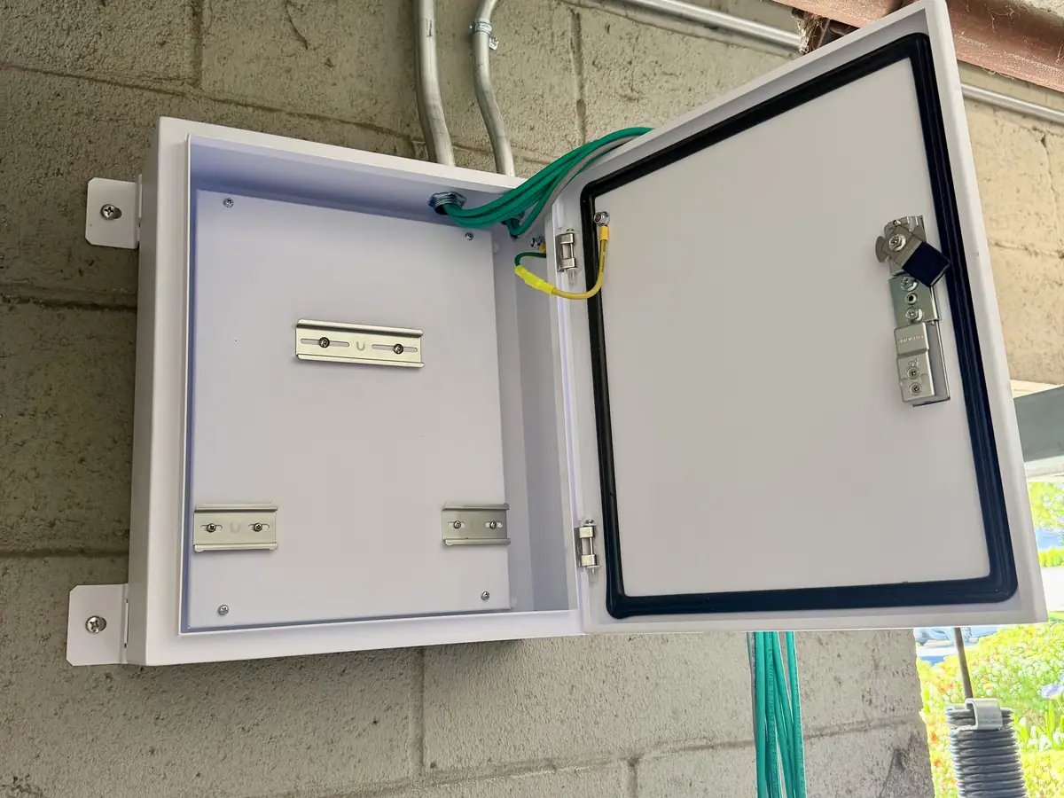 Empty junction enclosure with new Cat6 pulled in