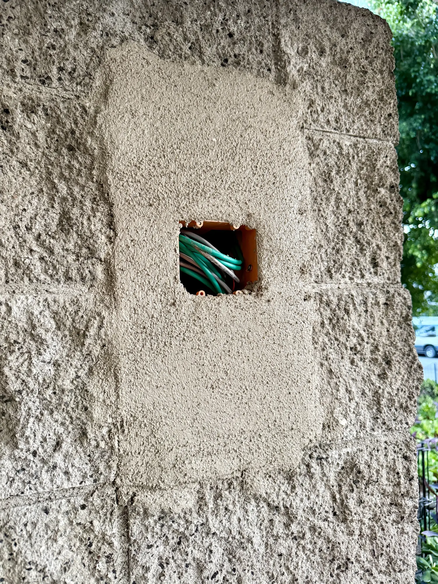 Pillar cutout patched with stucco