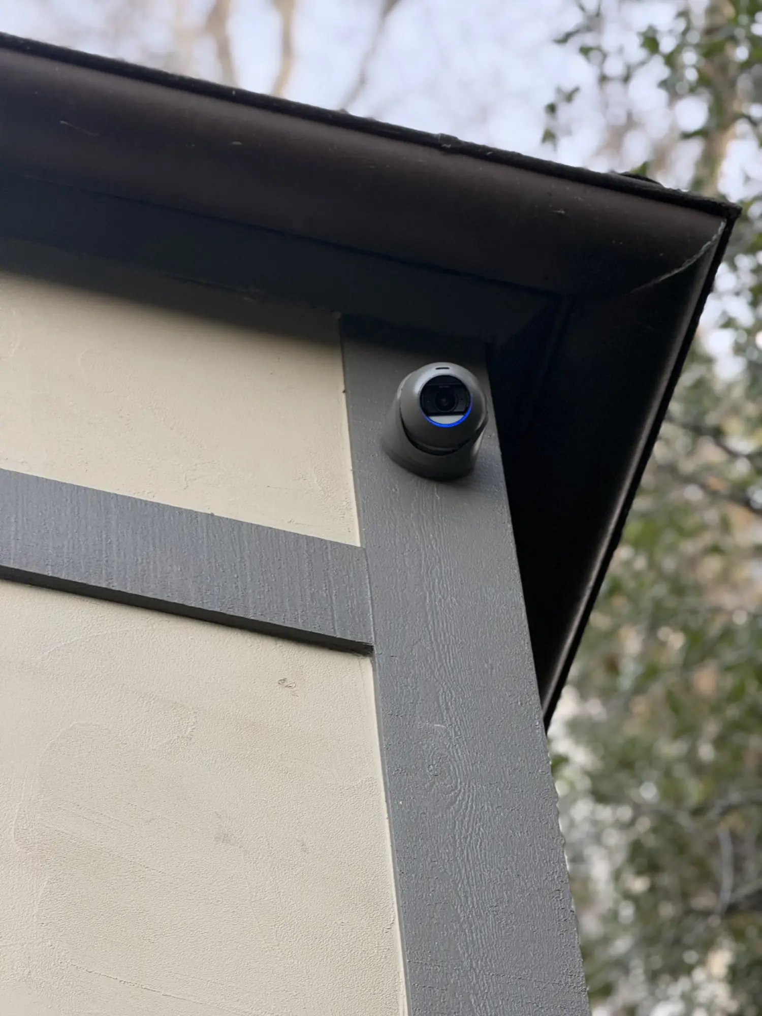 Turret camera under a roof gutter