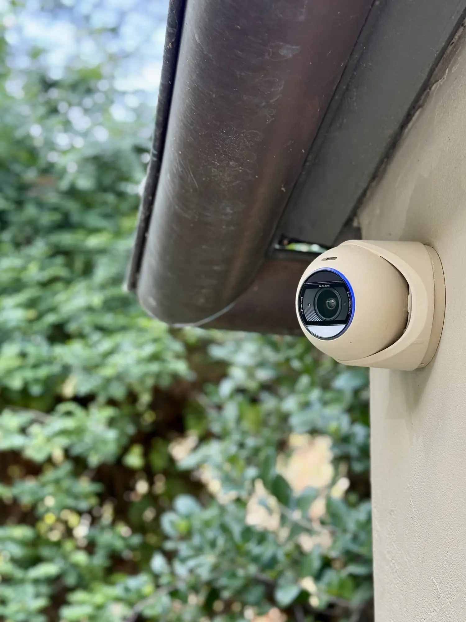 UniFi G6 Pro Turret camera, custom painted to match the building trim