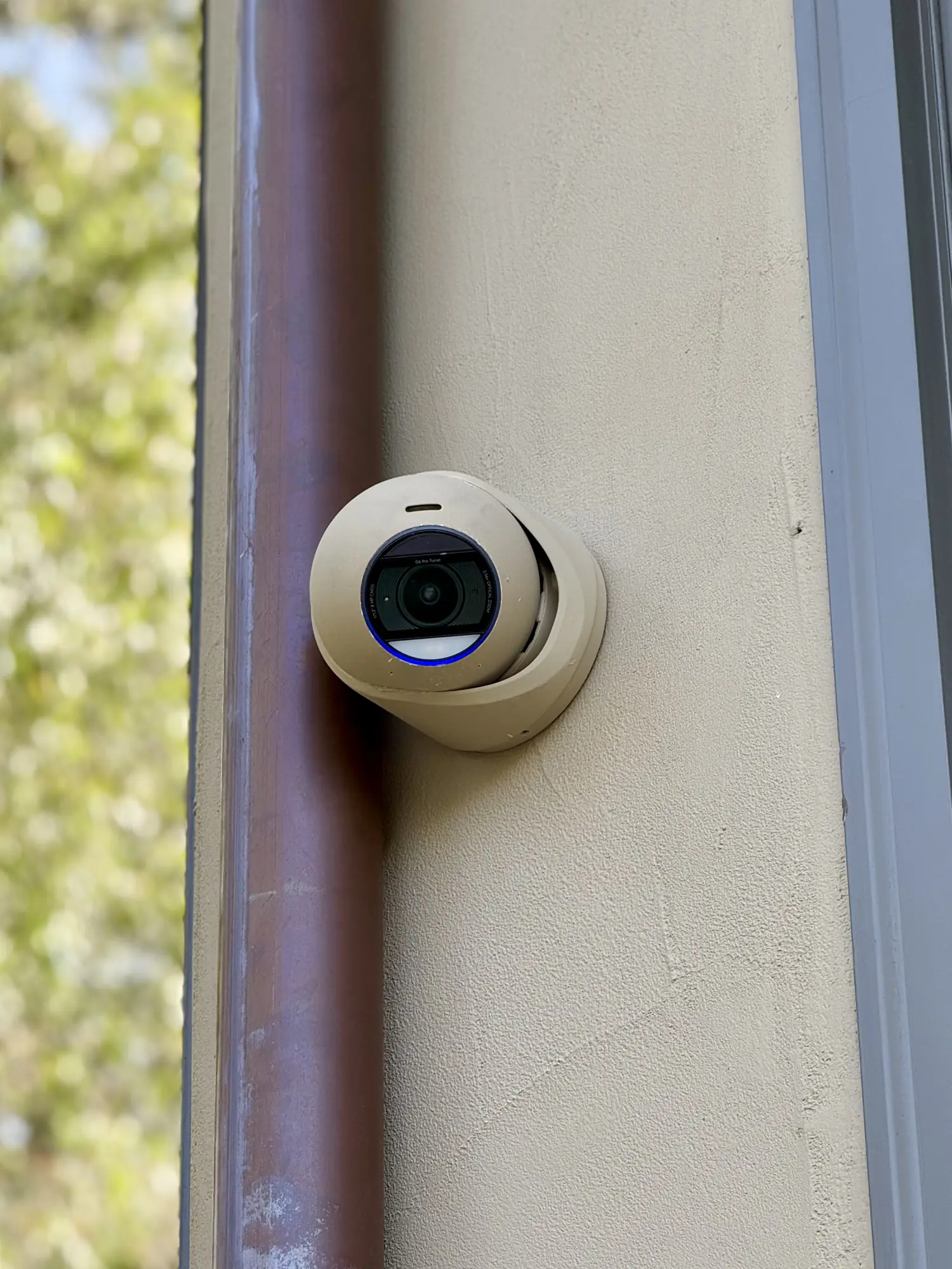 UniFi G6 Pro Turret camera, custom painted to match the building trim