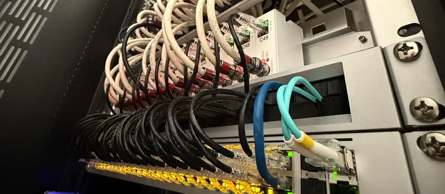 Rack with Long Reach extenders and a UniFi switch