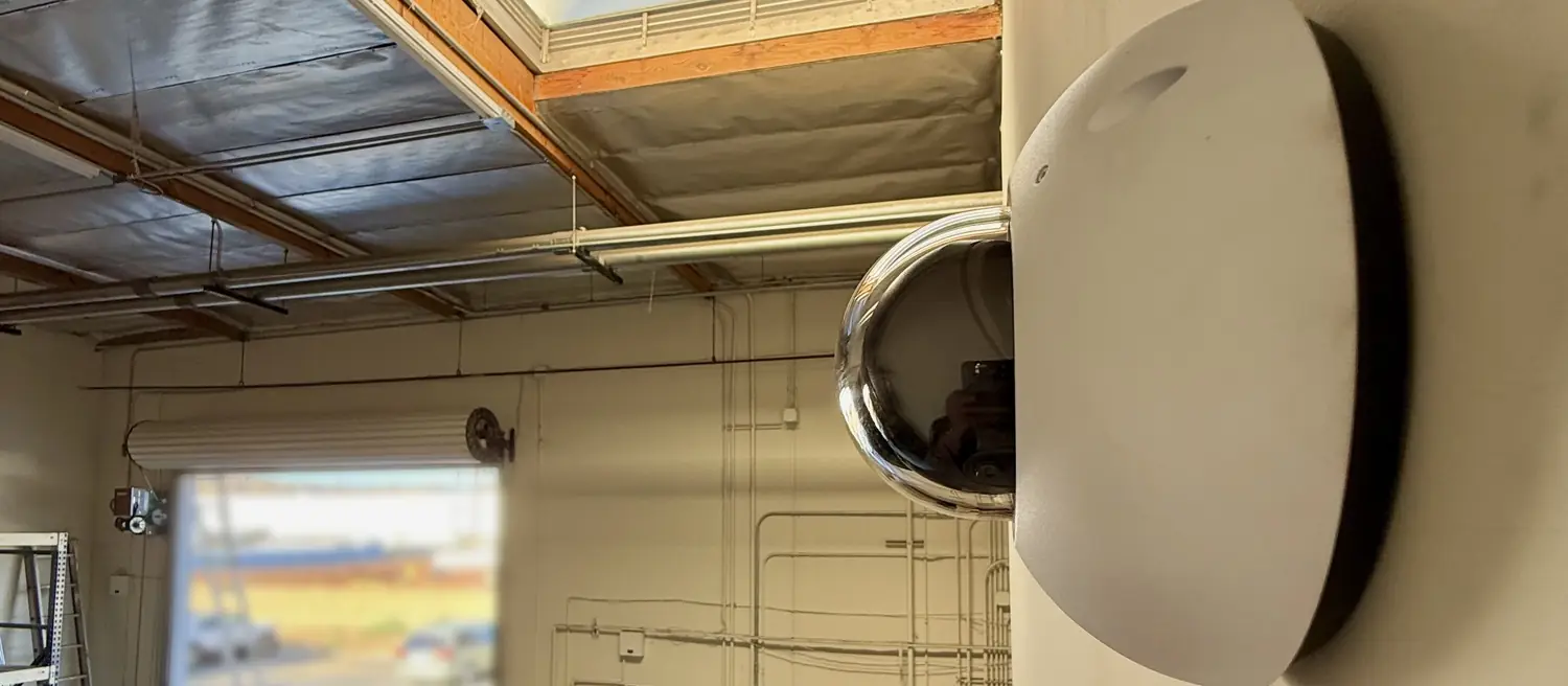 UniFi Protect dome camera in a warehouse