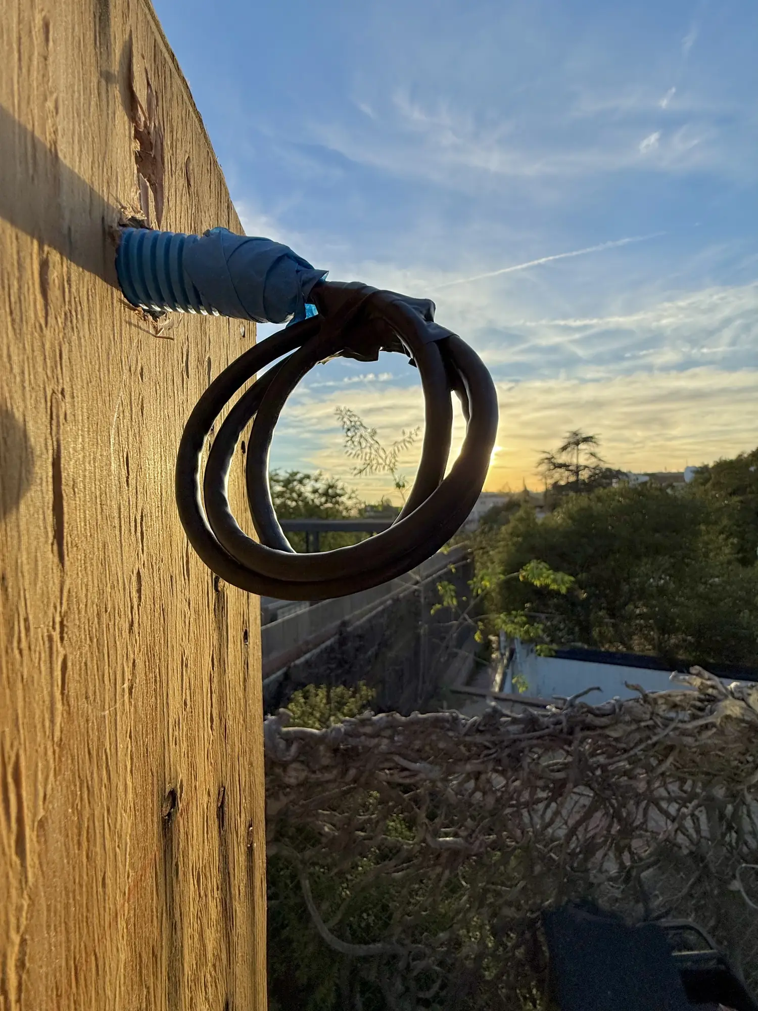 Flexible tube and coiled cable outdoors