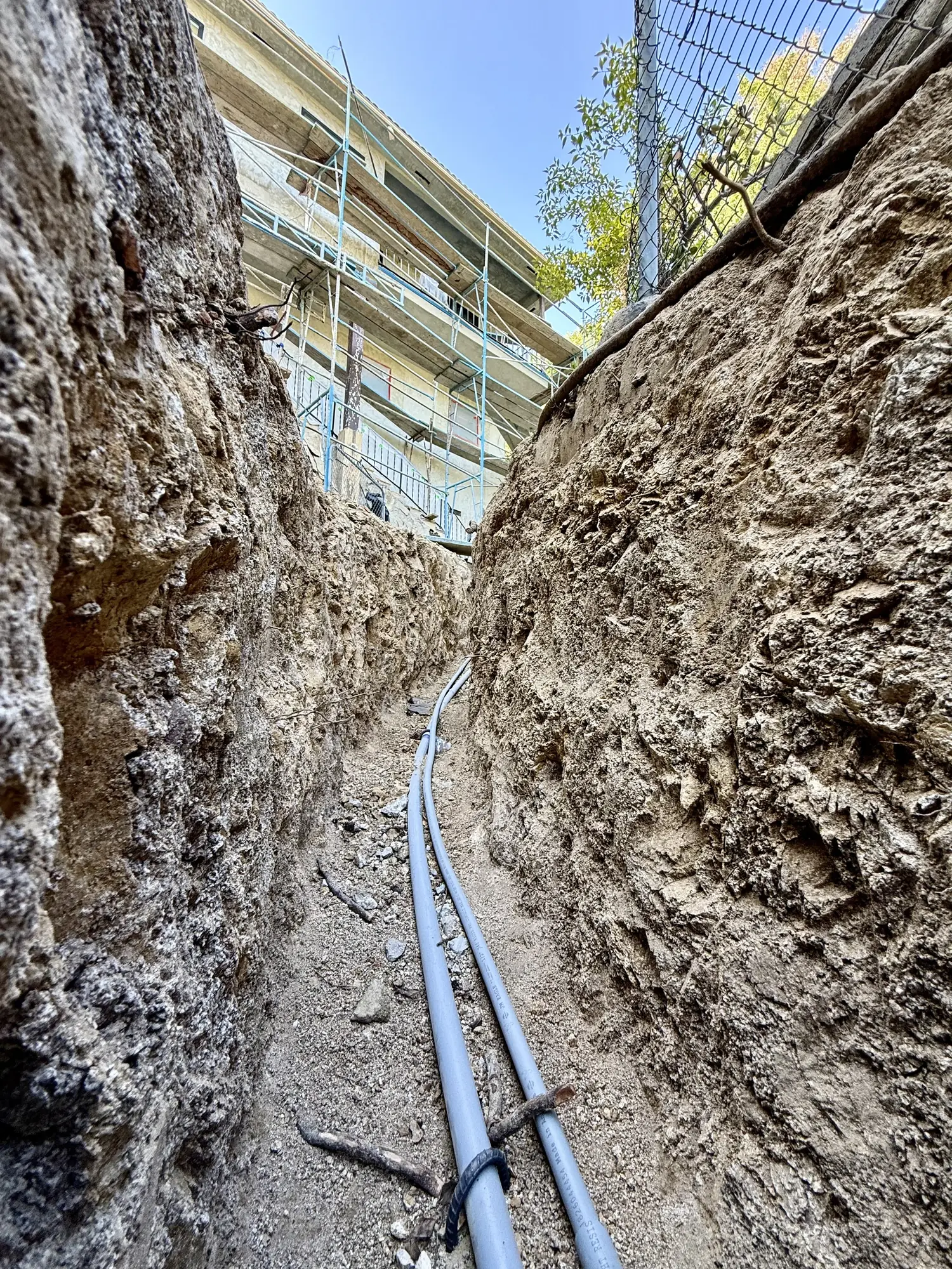 Conduit trench toward the house