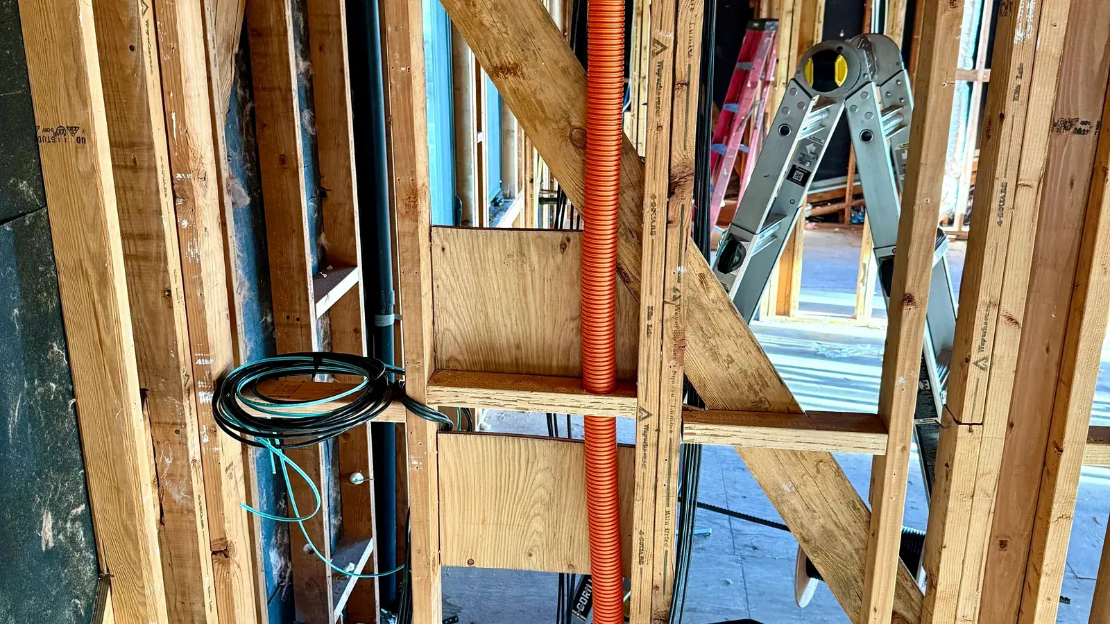 Wall framing with conduit and low-voltage cable