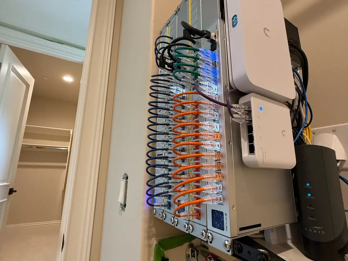 Finished wall-mount UniFi rack in the closet