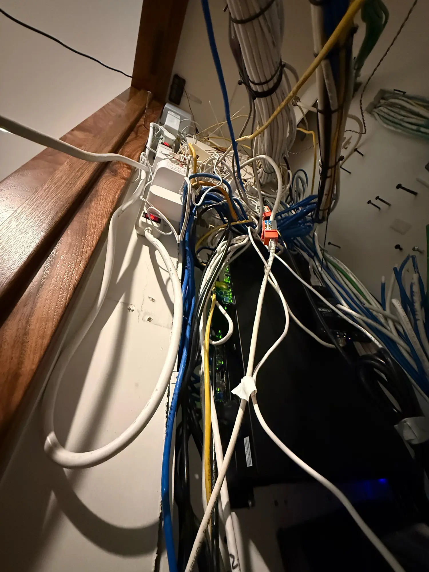 Crowded equipment space under the staircase