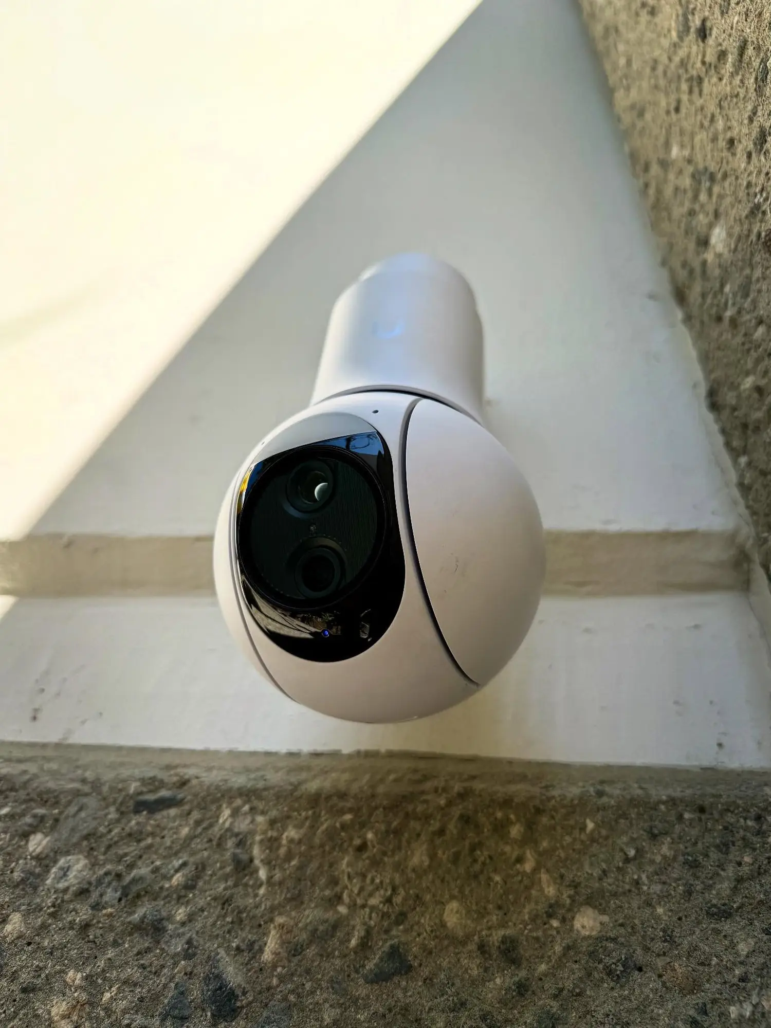 UniFi Protect PTZ camera on a wall