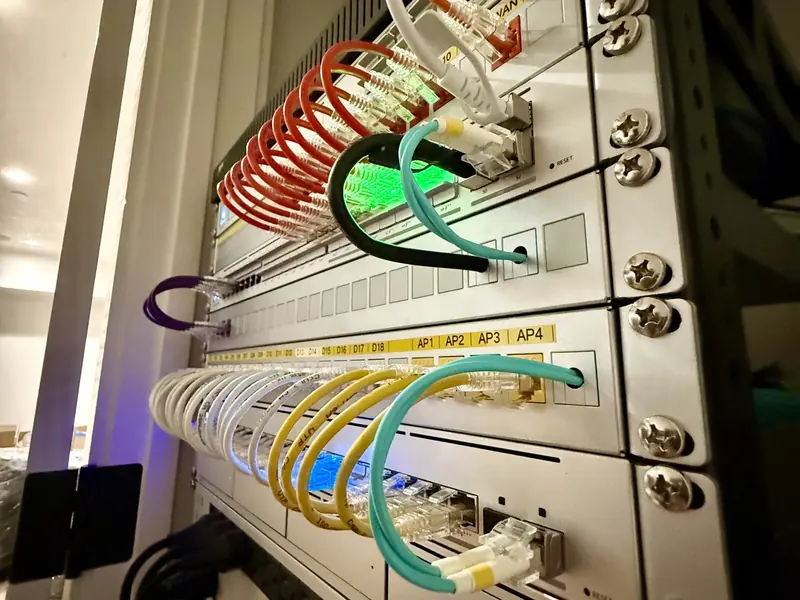 Equipment rack with patch cables