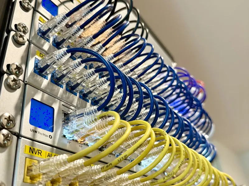 Patch cables plugged into a UniFi switch