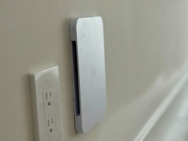 In-wall access point beside an outlet