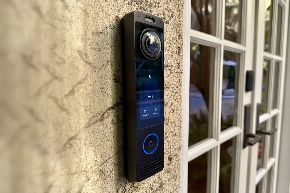 Intercom beside a glass door
