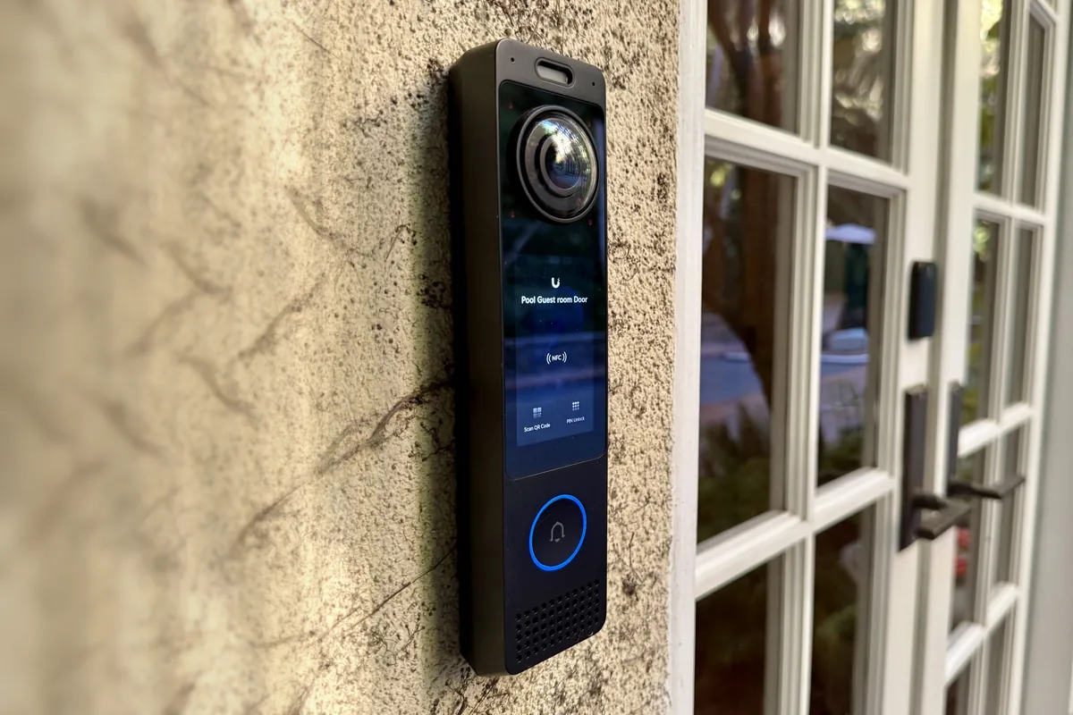 Intercom beside a glass door