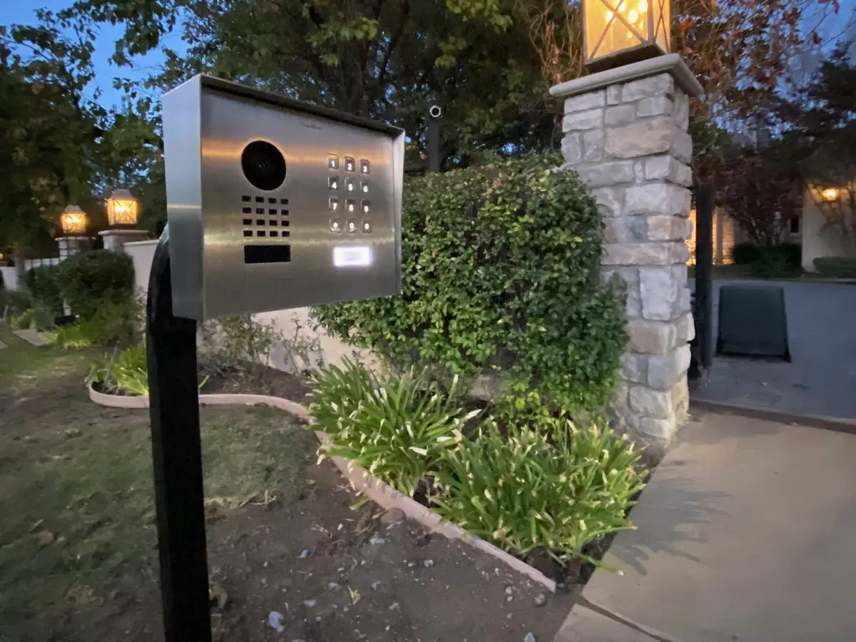 DoorBird door station and keypad on a pedestal