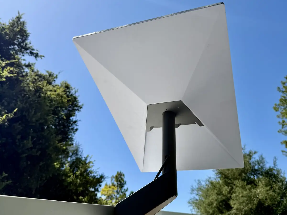 Starlink dish on a roofline arm