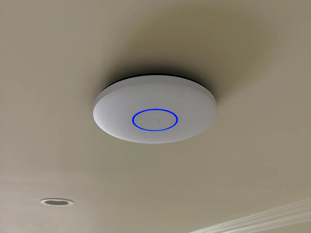 UniFi access point on a ceiling