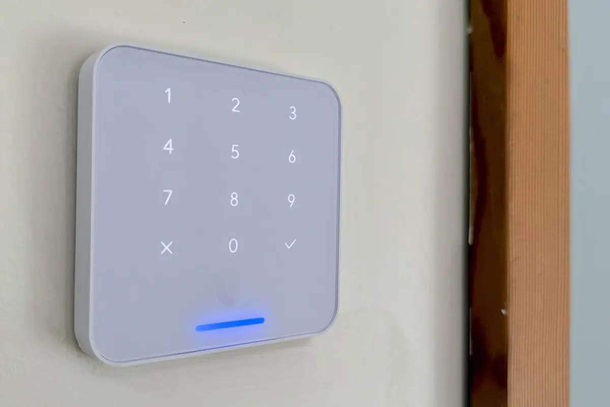 UniFi Access keypad beside a door frame