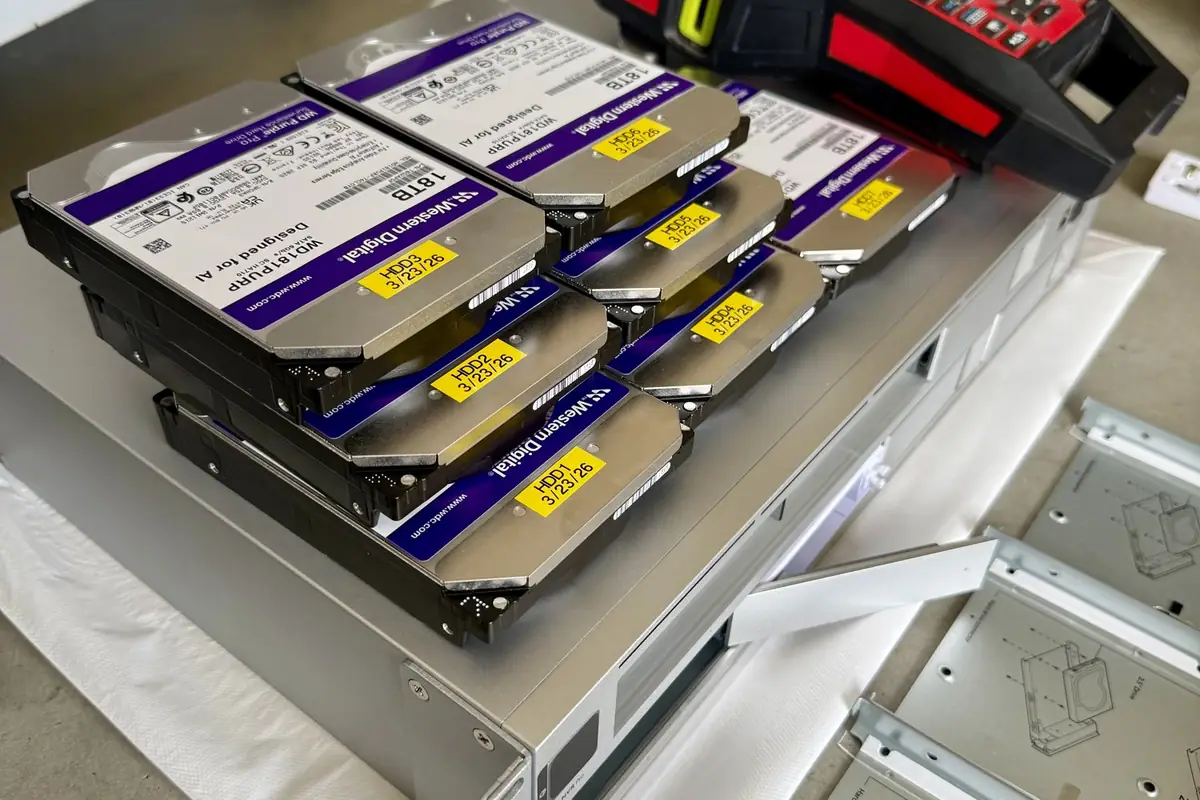 Hard drives and a rack-mount recorder before installation