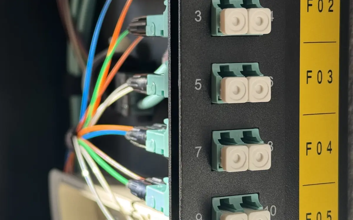 Duplex LC fiber connectors in a patch panel