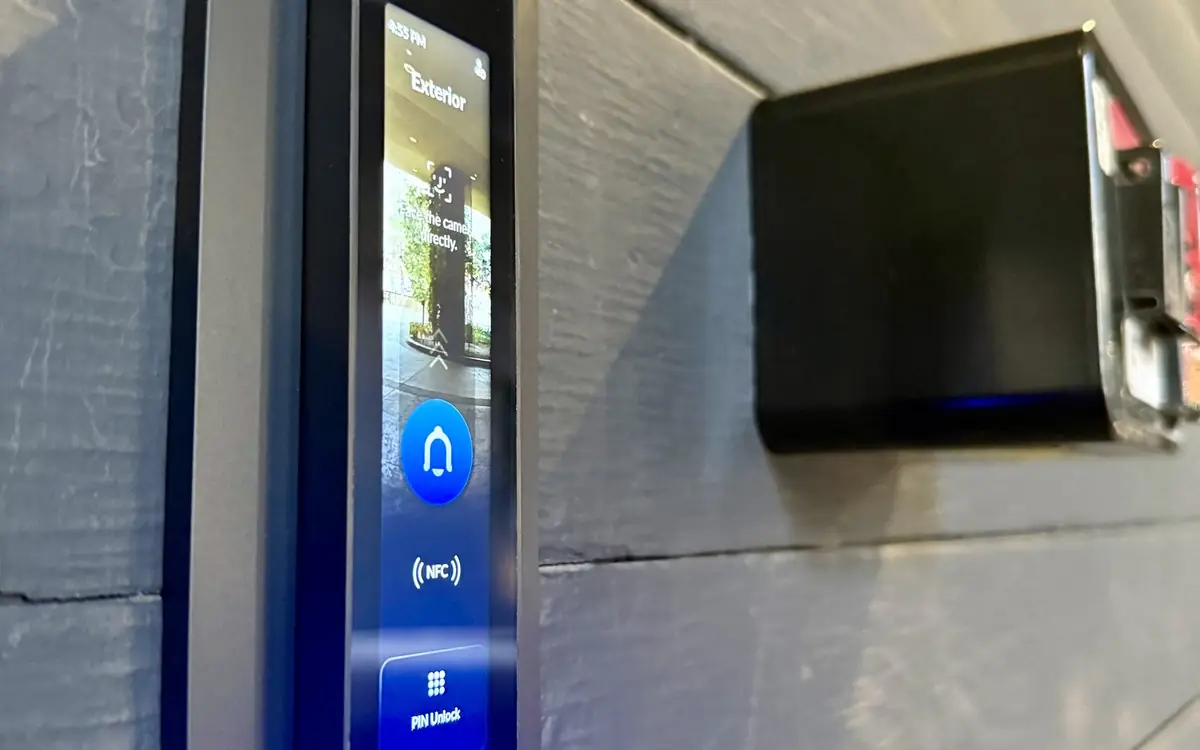 Wall mounted entry intercom with a light bar