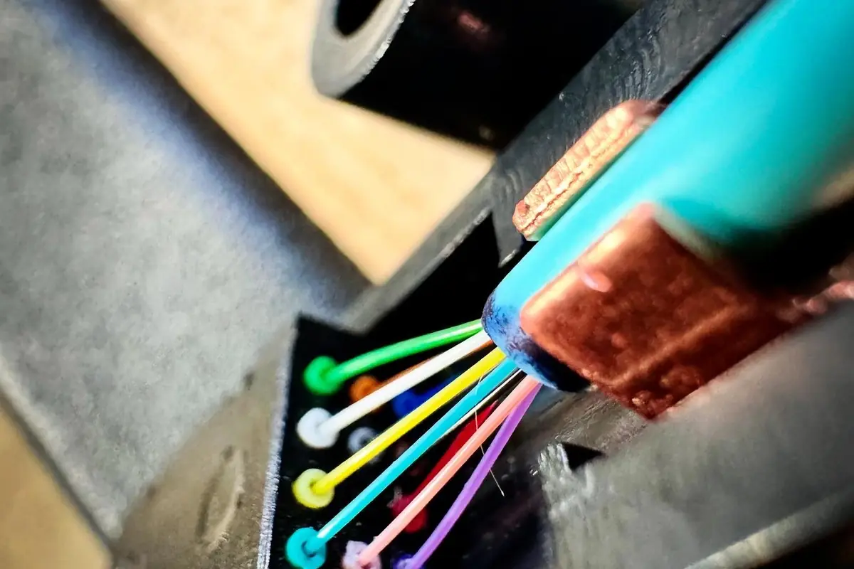 Fiber optic cable stripped back to show individual fibers