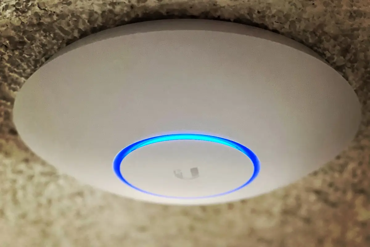 UniFi access point on a ceiling
