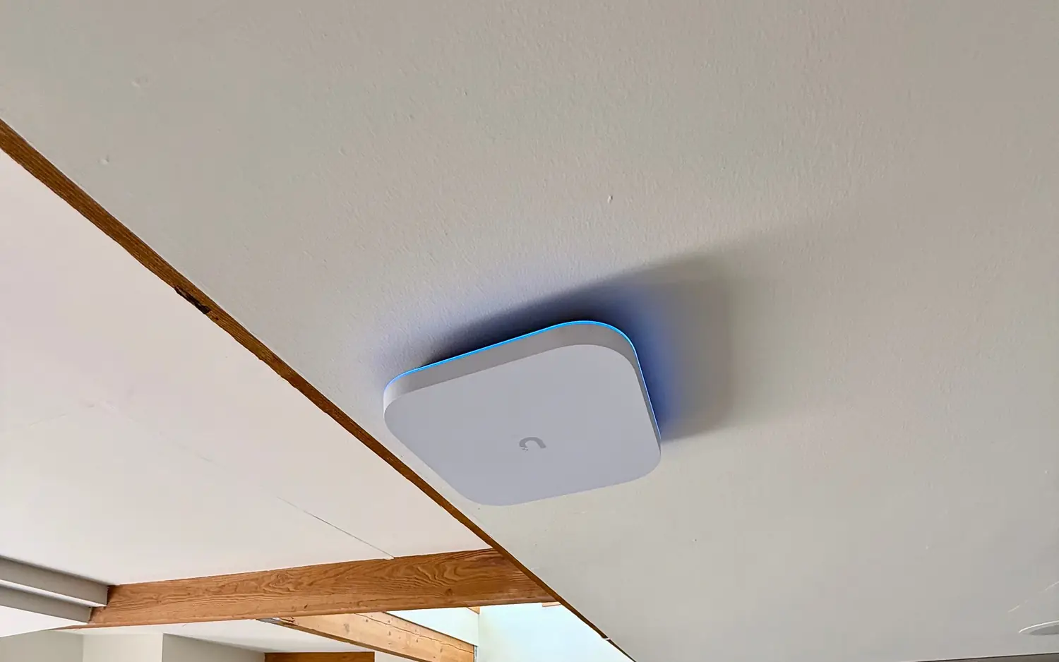 UniFi access point on a ceiling